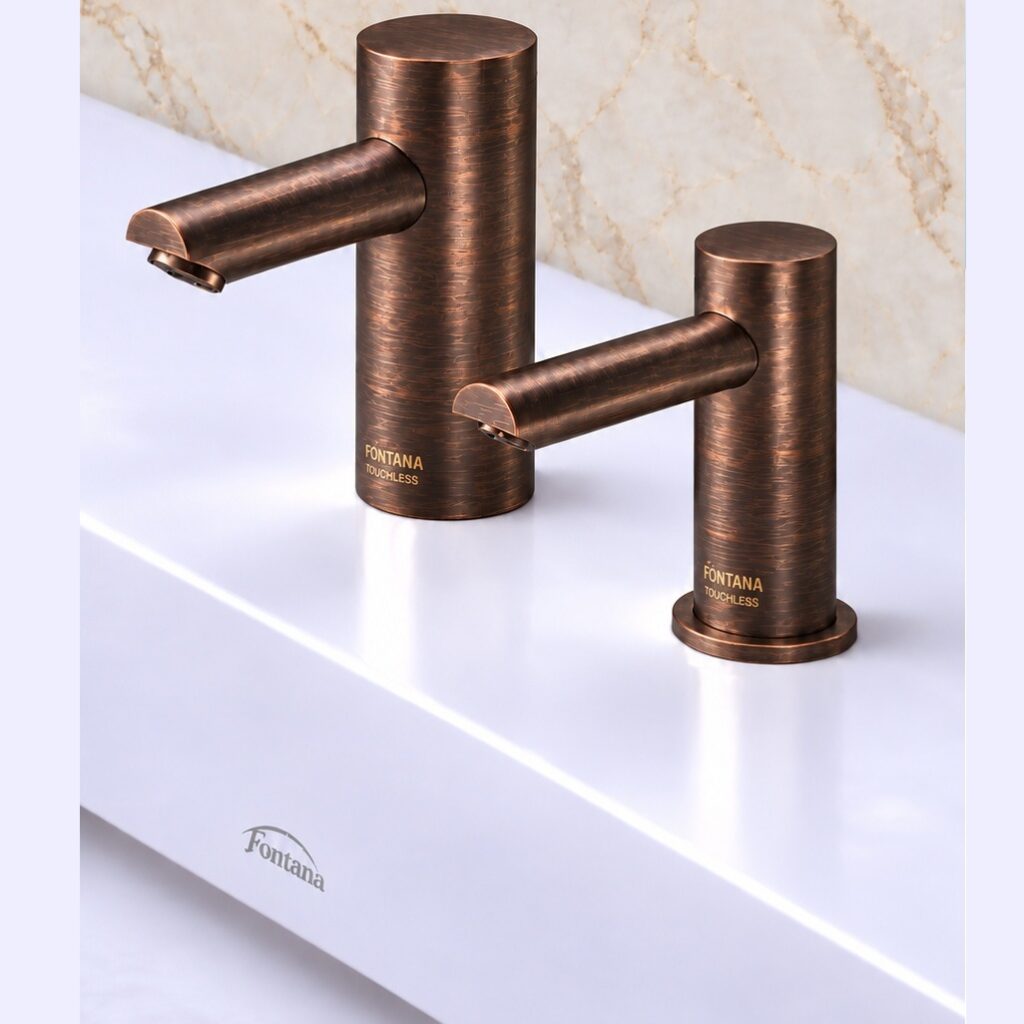 Fontana deck-mount touchless commercial bathroom set in a hand-rubbed antique brass finish