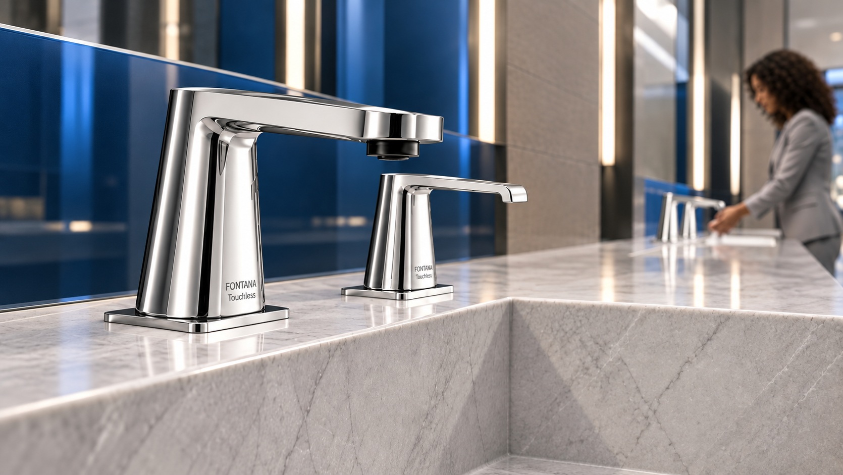 Row of touchless bathroom faucets in a high-traffic commercial washroom
